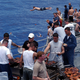 Illustration for article titled Steel Beach- When US Navy Ships Throw Giant Beach Picnic Parties